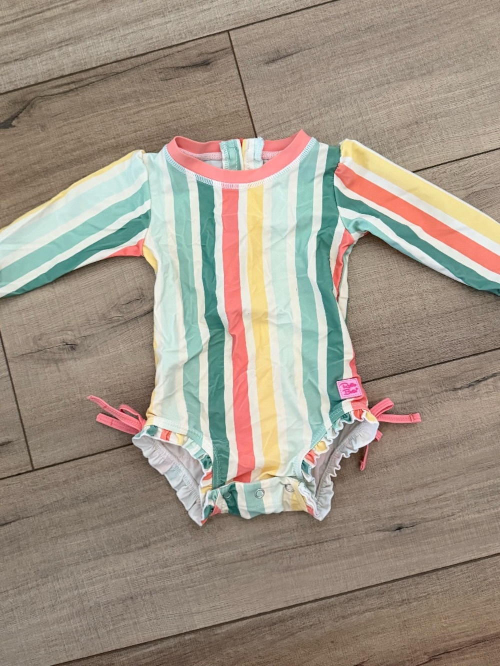 RuffleButts Striped Rashguard Swimsuit – 6-12 Months